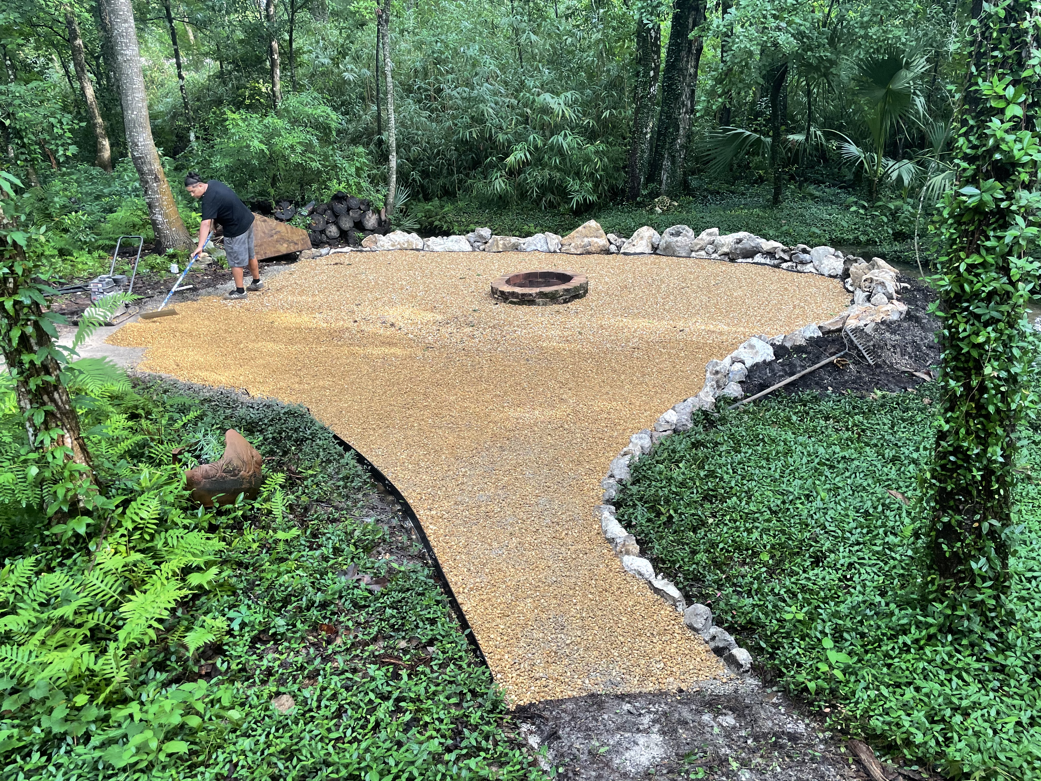 Elevated permeable hardscape to accommodate rising waters on a floodplain